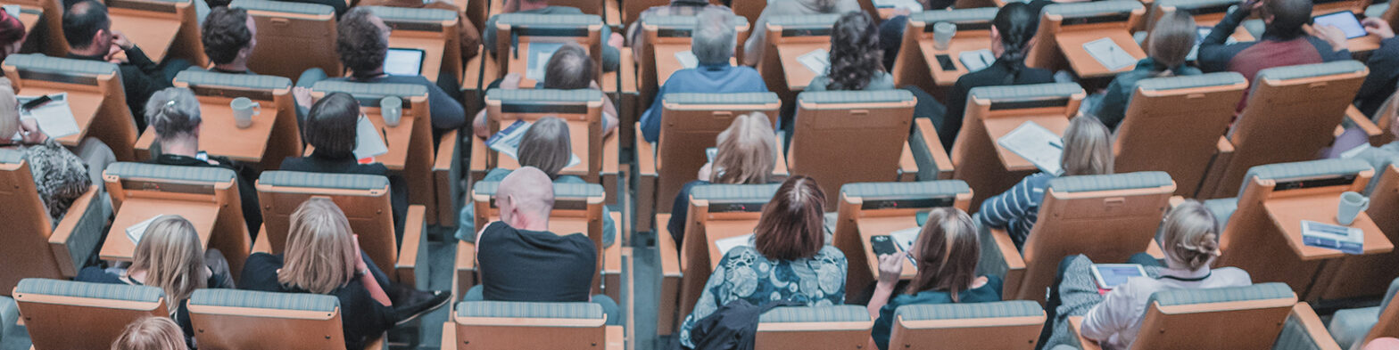 Stock image of conference attendees
