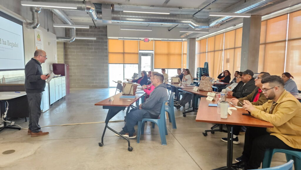 Participants listening to the instructor of the HomeStretch Workshop provided by Neighborhood Development Alliance